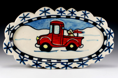 1_red-truck-in-snow-scalloped-oval